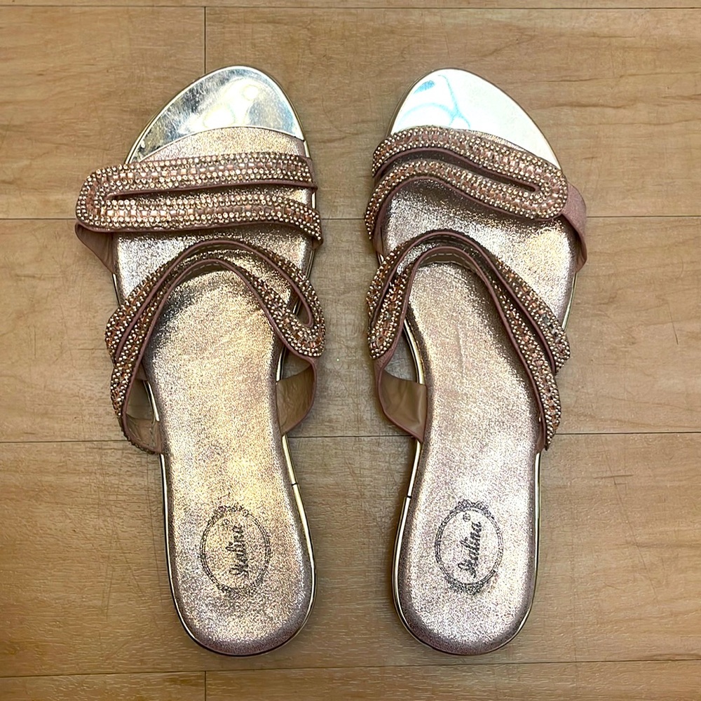 Italina rose gold sandals with straps.